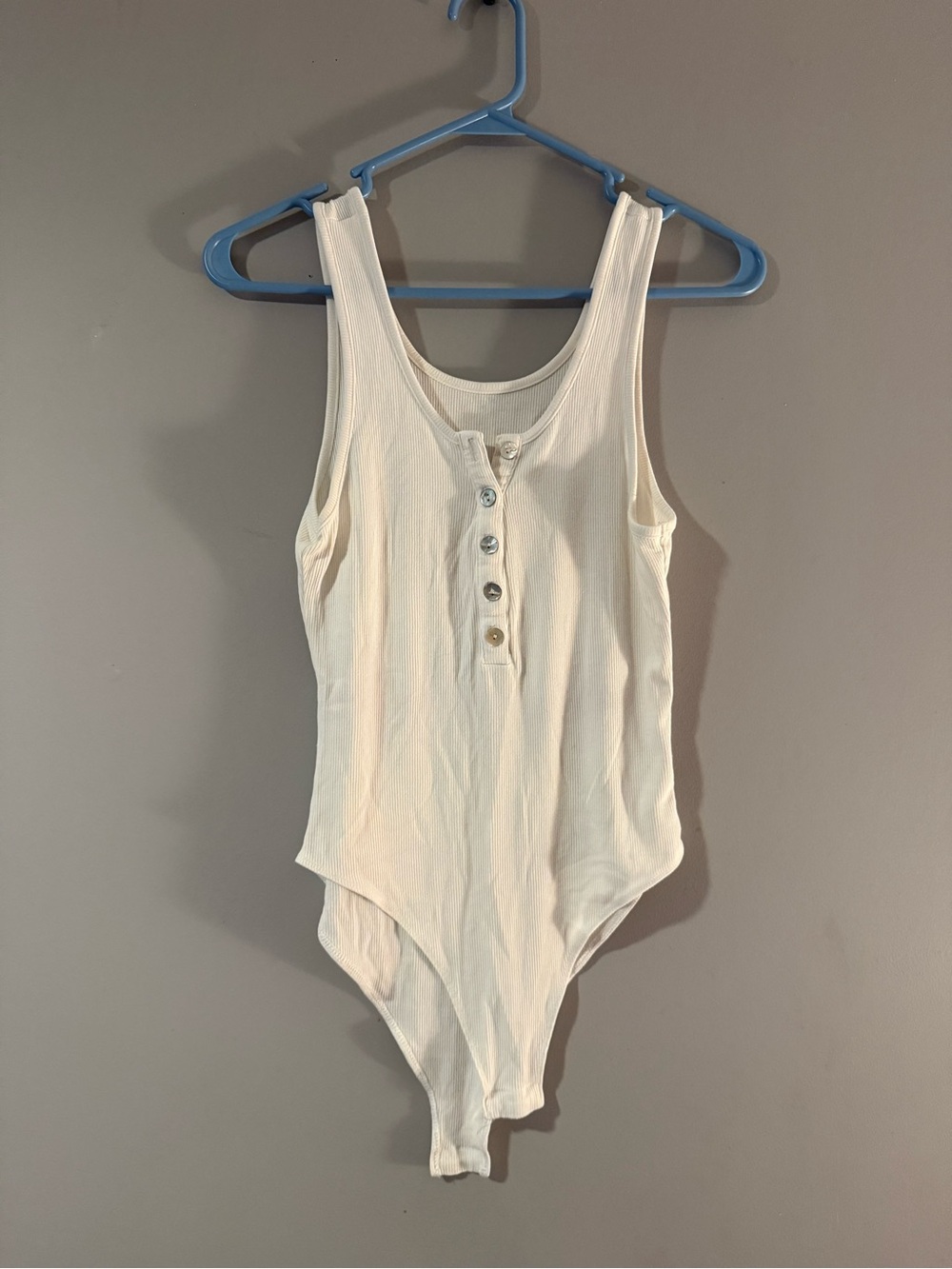Woman’s Cream Ribbed Henley Sleeveless Bodysuit